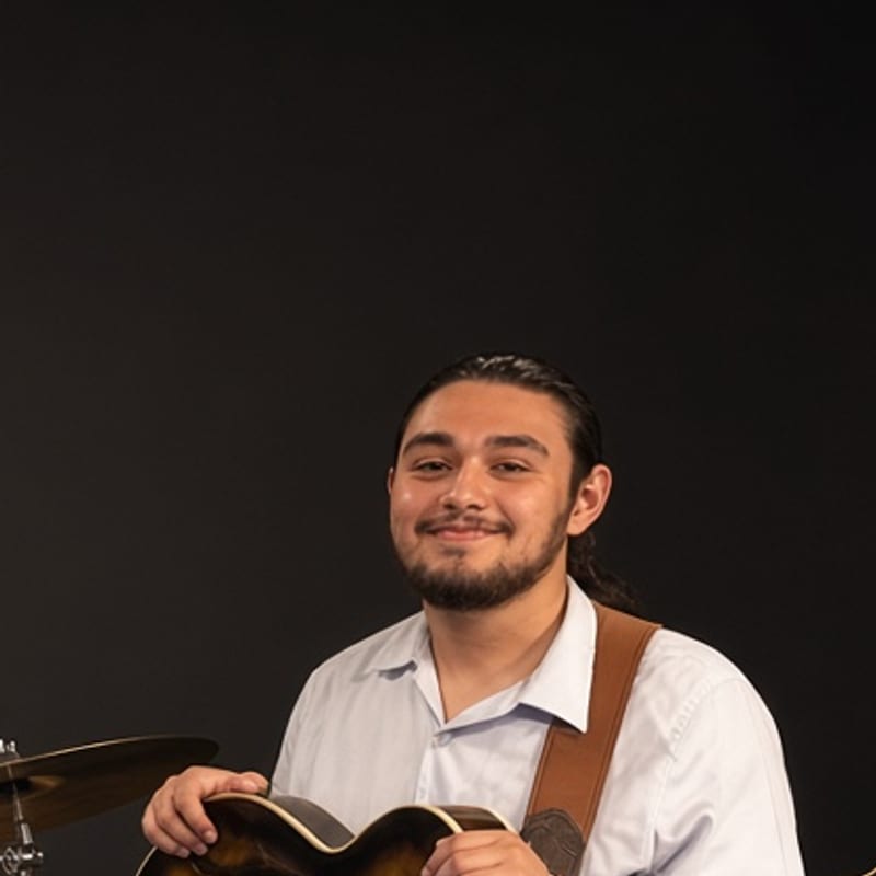 Portrait of Javier on guitar
